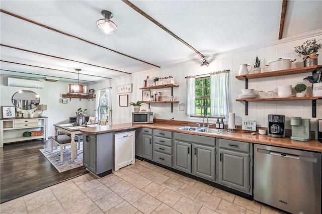 8995 Puritan Ln, Conneaut Twp, PA 16424 - kitchen with appliances with stainless steel finishes, open shelves, gray cabinets, a wall mounted AC, and beam ceiling