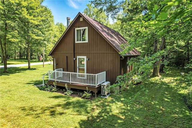 8995 Puritan Ln, Conneaut Twp, PA 16424 - rear view of house with a yard and a deck