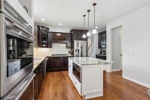 403 Worth Ct, Cranberry Twp, PA 16066 - kitchen featuring appliances with stainless steel finishes, ventilation hood, pendant lighting, dark wood-style floors, and recessed lighting