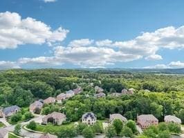 403 Worth Ct, Cranberry Twp, PA 16066 - drone / aerial view of a heavily wooded area