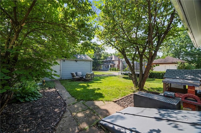 120 Euclid Ave, Sharon, PA 16146 - view of green lawn with a storage unit and a patio area