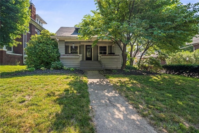 120 Euclid Ave, Sharon, PA 16146 - view of property hidden behind natural elements featuring a front yard and a porch