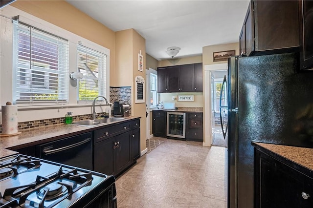 120 Euclid Ave, Sharon, PA 16146 - kitchen featuring beverage cooler, black appliances, and backsplash