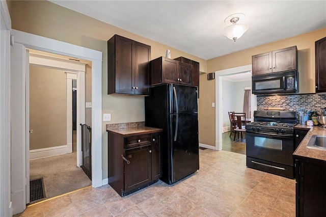 120 Euclid Ave, Sharon, PA 16146 - kitchen featuring black appliances, dark brown cabinetry, and backsplash