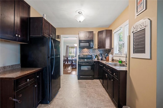 120 Euclid Ave, Sharon, PA 16146 - kitchen with black appliances, decorative backsplash, plenty of natural light, and dark brown cabinetry