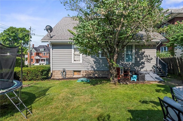 120 Euclid Ave, Sharon, PA 16146 - rear view of house featuring a trampoline and roof with shingles