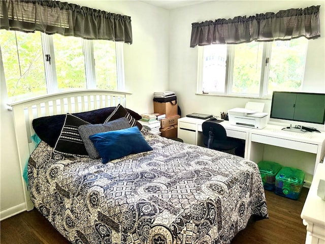 110 Surrey St, Monessen, PA 15062 - bedroom featuring wood finished floors and multiple windows