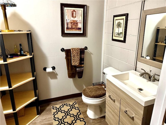 110 Surrey St, Monessen, PA 15062 - bathroom featuring vanity and wood finished floors