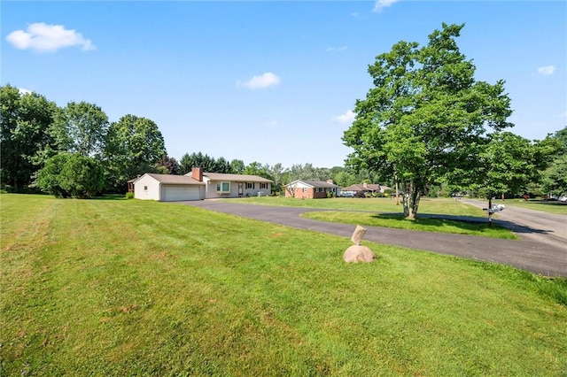 4852 Thomason Rd, South Pymatuning Twp, PA 16150 - single story home with a front lawn and a detached garage