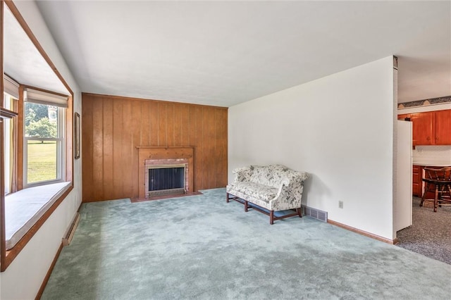 4852 Thomason Rd, South Pymatuning Twp, PA 16150 - sitting room with carpet, a fireplace with flush hearth, and wood walls