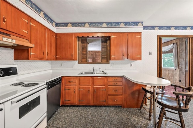 4852 Thomason Rd, South Pymatuning Twp, PA 16150 - kitchen with white electric stove, dishwasher, under cabinet range hood, wallpapered walls, and light countertops