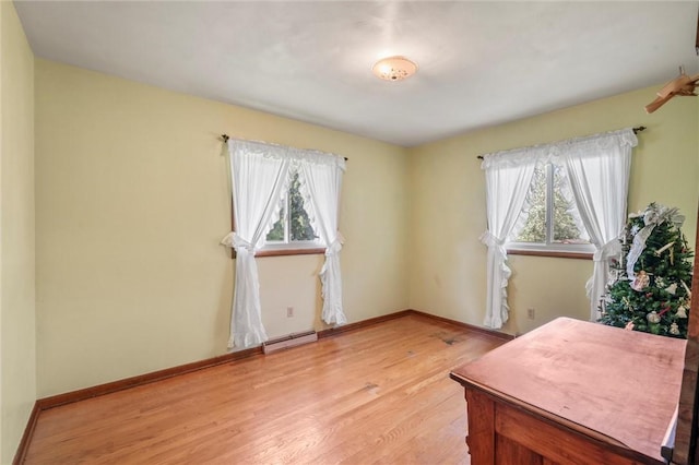 4852 Thomason Rd, South Pymatuning Twp, PA 16150 - office with a baseboard radiator, plenty of natural light, and wood finished floors