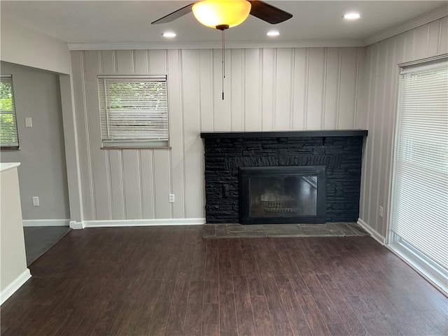 634 Idaho Ave, Verona, PA 15147 - unfurnished living room with wood finished floors, a ceiling fan, a fireplace, and ornamental molding