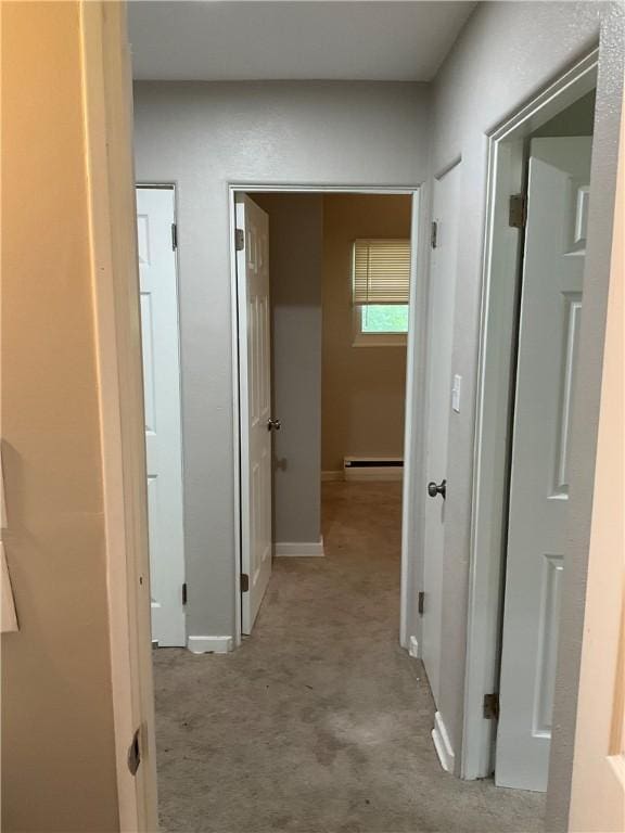 634 Idaho Ave, Verona, PA 15147 - hallway with a baseboard heating unit and carpet floors