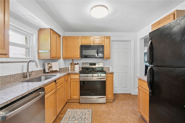 3863 Beechwood Blvd, Greenfield, PA 15217 - kitchen with black appliances, light stone counters, and light tile patterned flooring