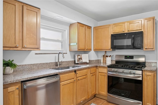 3863 Beechwood Blvd, Greenfield, PA 15217 - kitchen with appliances with stainless steel finishes, light stone counters, and light tile patterned floors