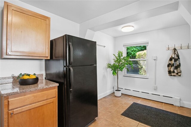 3863 Beechwood Blvd, Greenfield, PA 15217 - kitchen with freestanding refrigerator, a baseboard radiator, and light tile patterned floors