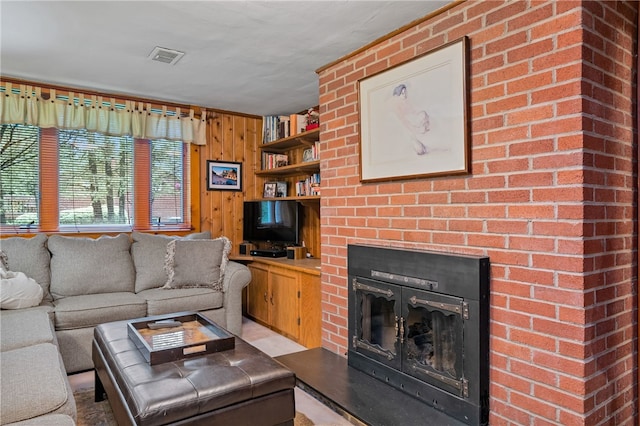 2666 Pointview Dr, Hampton, PA 15101 - living room featuring a brick fireplace and wooden walls