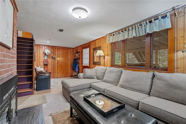 2666 Pointview Dr, Hampton, PA 15101 - living room with wooden walls and stairs