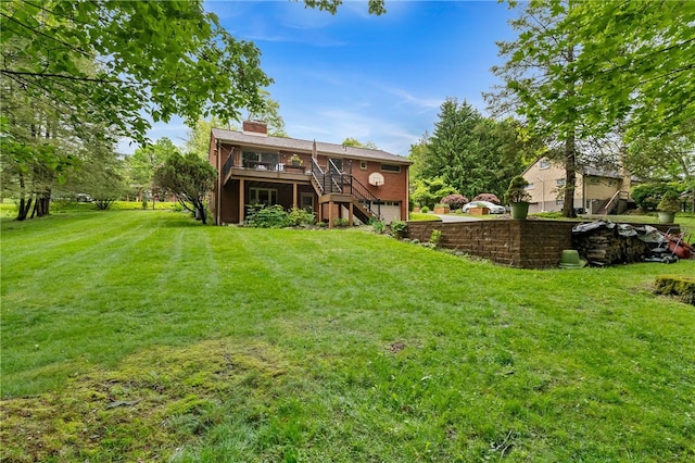 2666 Pointview Dr, Hampton, PA 15101 - rear view of property with stairway, a deck, a chimney, a yard, and a garage