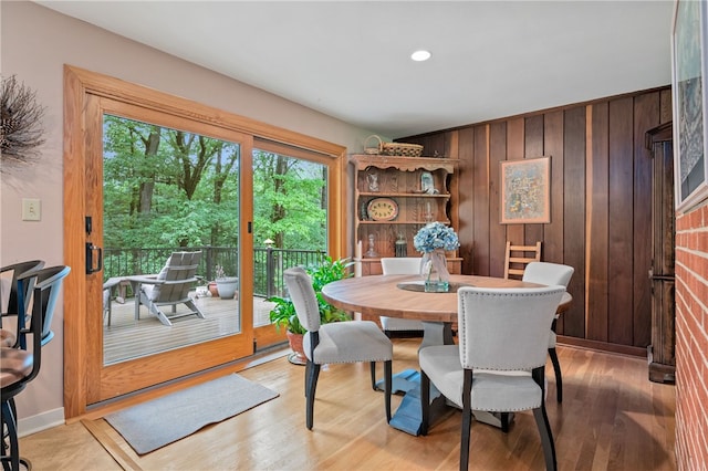 2666 Pointview Dr, Hampton, PA 15101 - dining area featuring wood walls and light wood-style flooring