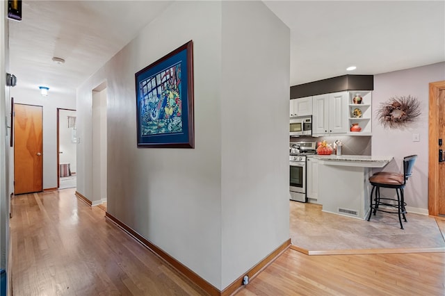 2666 Pointview Dr, Hampton, PA 15101 - hallway with light wood-type flooring and baseboards