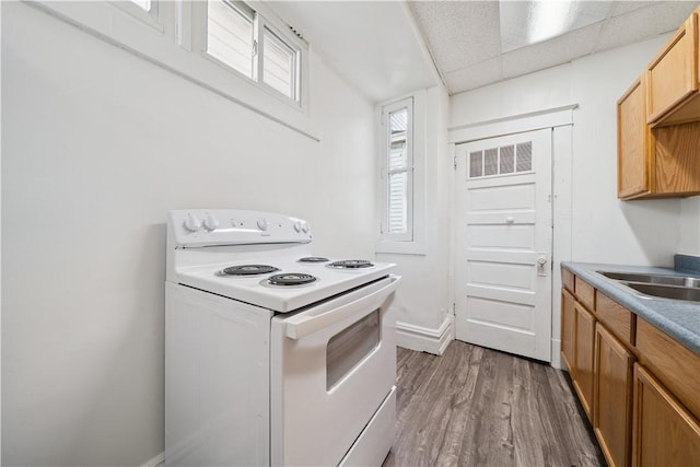 422 N 3rd St, Jeannette, PA 15644 - kitchen featuring electric stove and wood finished floors
