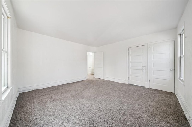 422 N 3rd St, Jeannette, PA 15644 - unfurnished bedroom featuring carpet and multiple windows
