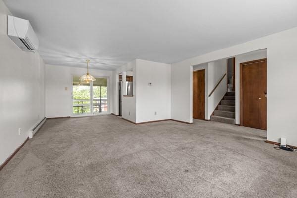 408 Circle Dr, Franklin Twp, PA 16117 - unfurnished living room with a wall mounted air conditioner, a baseboard radiator, stairs, and carpet