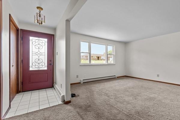 408 Circle Dr, Franklin Twp, PA 16117 - foyer entrance featuring baseboard heating and light colored carpet