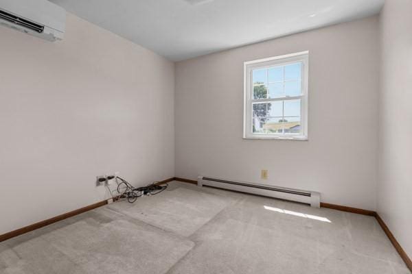 408 Circle Dr, Franklin Twp, PA 16117 - unfurnished room with baseboard heating, a wall unit AC, and carpet floors
