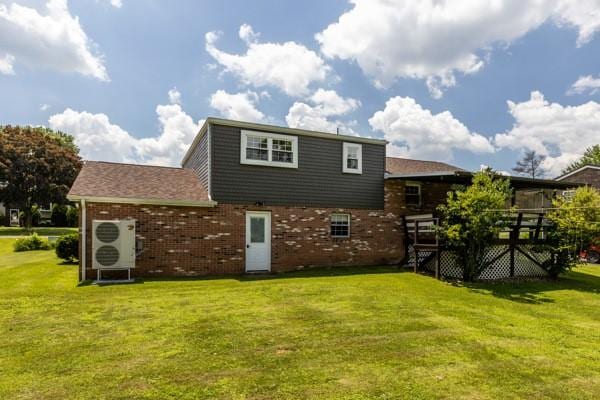 408 Circle Dr, Franklin Twp, PA 16117 - back of property with a lawn and brick siding