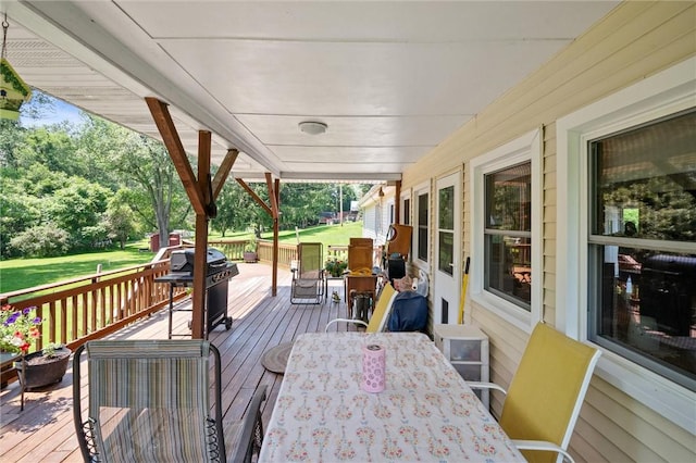 817 E Jamestown Rd, Green Twp, PA 16134 - wooden deck with outdoor dining space, area for grilling, a lawn, and view of scattered trees