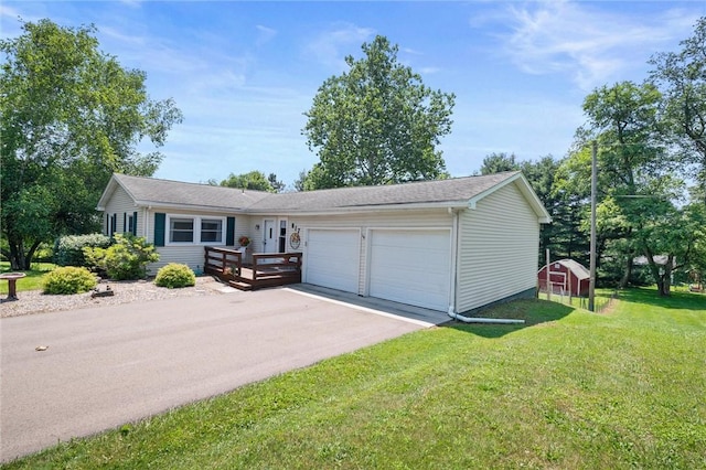 817 E Jamestown Rd, Green Twp, PA 16134 - single story home featuring an attached garage, a storage shed, a front yard, and driveway