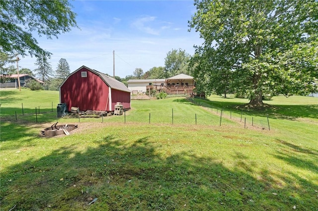 817 E Jamestown Rd, Green Twp, PA 16134 - view of yard featuring a barn, an outbuilding, and an outdoor fire pit