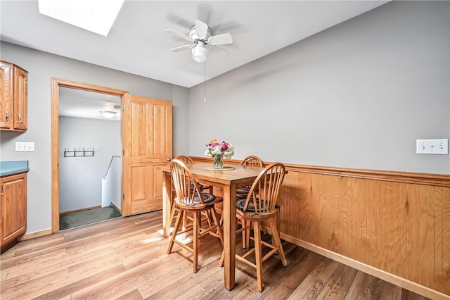 2801 Valley View Rd, South Pymatuning Twp, PA 16150 - dining area with light wood-style flooring, a ceiling fan, and a skylight