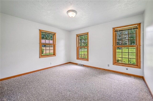 2801 Valley View Rd, South Pymatuning Twp, PA 16150 - empty room with carpet flooring and a textured ceiling