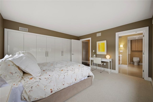 316 Beaver St Unit 301, Sewickley, PA 15143 - bedroom featuring a closet, light colored carpet, and connected bathroom