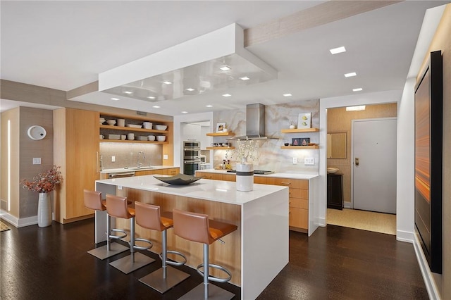 316 Beaver St Unit 301, Sewickley, PA 15143 - kitchen featuring open shelves, wall chimney exhaust hood, light countertops, backsplash, and recessed lighting