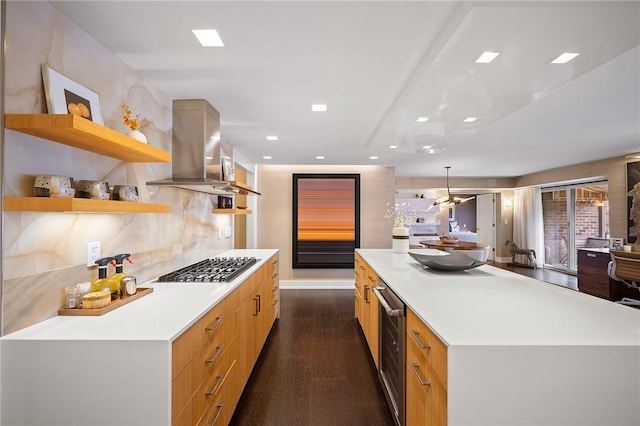 316 Beaver St Unit 301, Sewickley, PA 15143 - kitchen featuring island exhaust hood, modern cabinets, beverage cooler, light countertops, and stainless steel gas cooktop