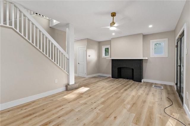 3656 Baytree, Observatory Hill, PA 15214 - unfurnished living room featuring stairway, wood finished floors, ceiling fan, a fireplace, and recessed lighting