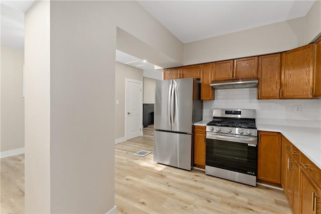 3656 Baytree, Observatory Hill, PA 15214 - kitchen featuring stainless steel appliances, under cabinet range hood, and brown cabinets