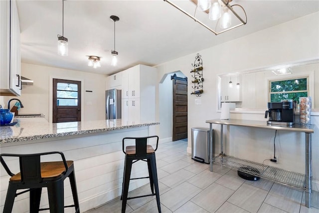 115 Muddy Creek Dr, Center Twp, PA 16001 - kitchen featuring stainless steel refrigerator with ice dispenser, light stone counters, a peninsula, and white cabinetry