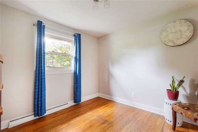 115 Muddy Creek Dr, Center Twp, PA 16001 - unfurnished room with a baseboard radiator and light wood finished floors