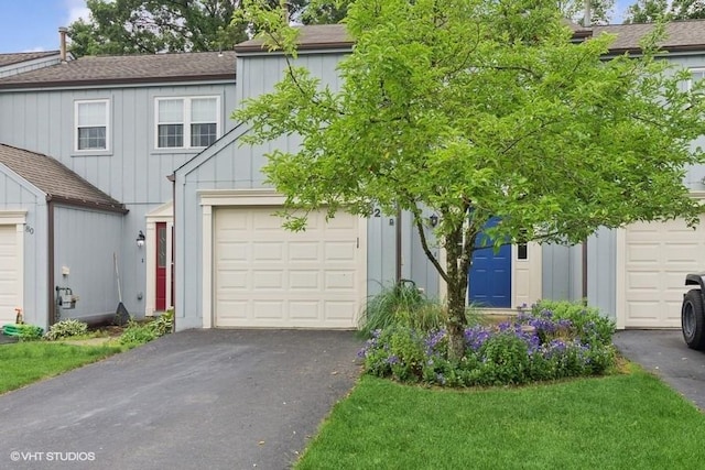 82 Monmouth Dr, Cranberry Twp, PA 16066 - view of front of property with asphalt driveway, board and batten siding, and a shingled roof