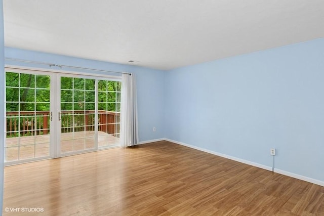 82 Monmouth Dr, Cranberry Twp, PA 16066 - unfurnished room with wood finished floors and baseboards