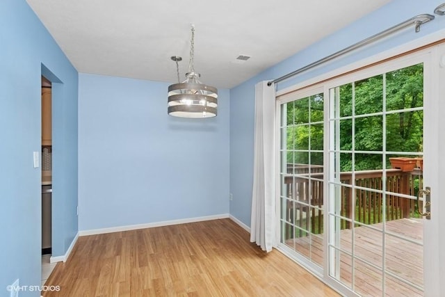 82 Monmouth Dr, Cranberry Twp, PA 16066 - unfurnished dining area featuring light wood-type flooring and baseboards