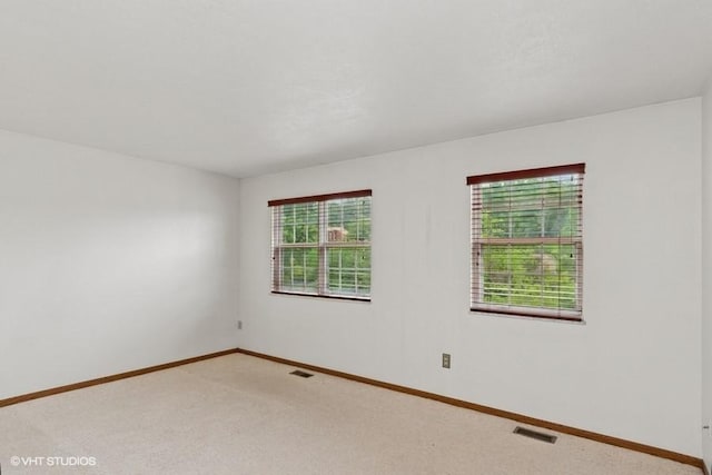 82 Monmouth Dr, Cranberry Twp, PA 16066 - unfurnished room with baseboards and light carpet