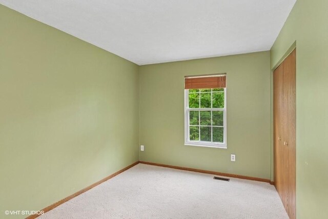 82 Monmouth Dr, Cranberry Twp, PA 16066 - unfurnished room featuring baseboards and light colored carpet