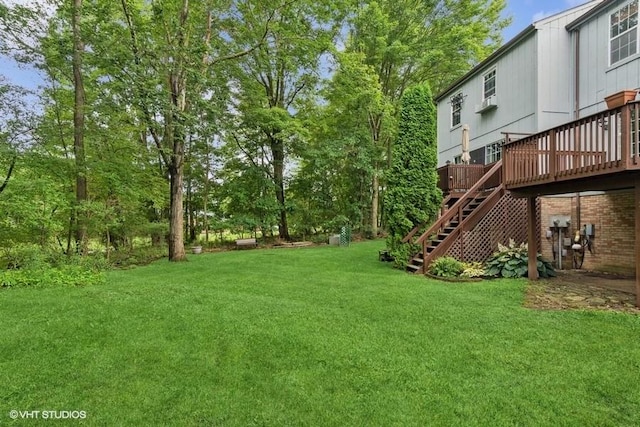 82 Monmouth Dr, Cranberry Twp, PA 16066 - view of grassy yard with stairway and a wooden deck